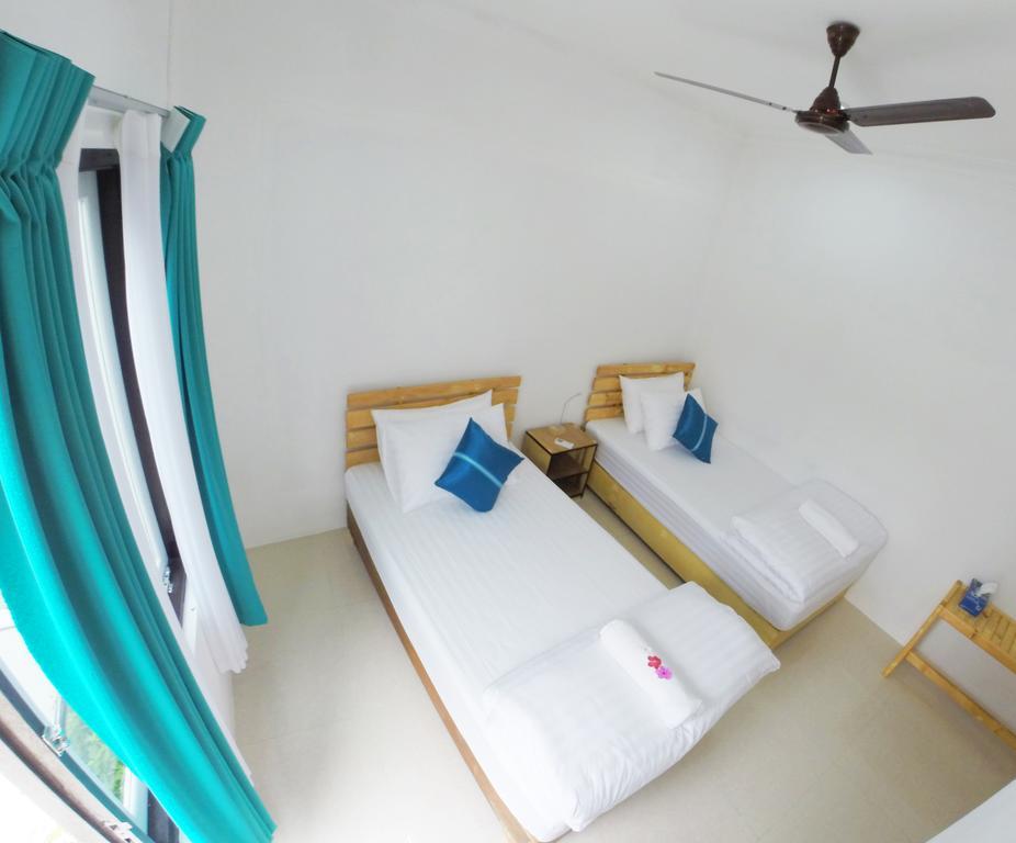 Guraidhoo Inn Номер фото
